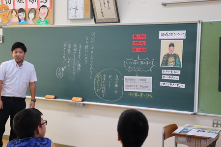 授業をする研究主任
